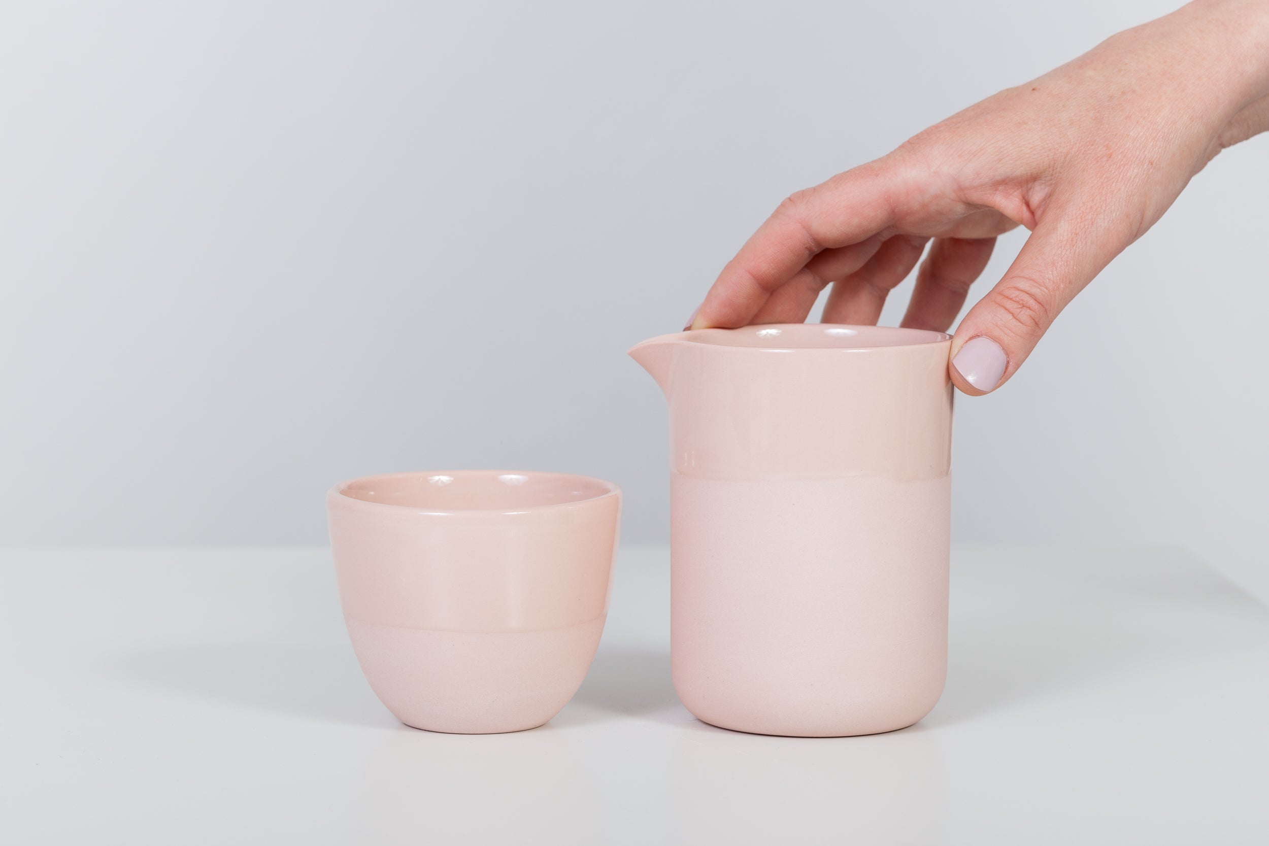 Simple pink jug with cup